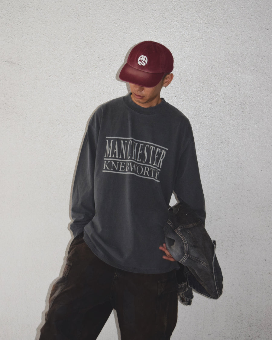 "マンチェスター" "ネブワース"カルチャーの発信源の地をスーベニア風にプリントデザインしブラックに顔料染めしたロンT