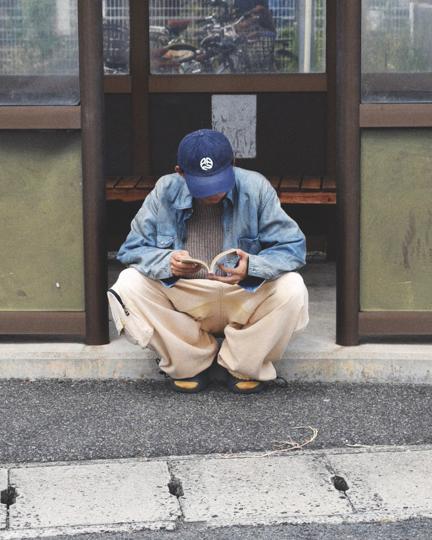 ANACHRONORMとJOUNAL STANDARDがコラボレーションした、ハードウォッシュダメージリメイク加工を施したカバーオール