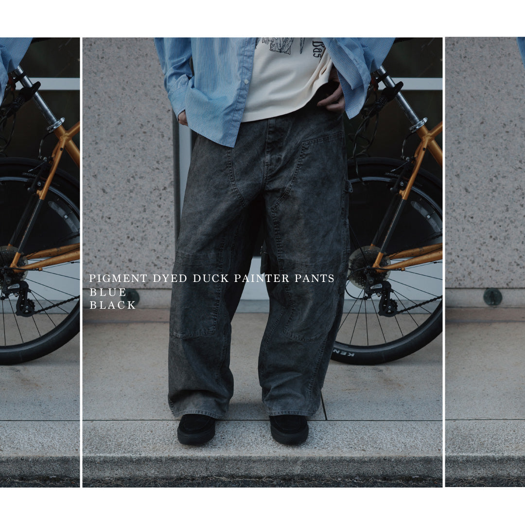 通年着用できるスタンダードなペインターパンツ。ややワイドで長めに設定したレングスは、ミリ単位の調整により絶妙なバランスに仕上げました。素材には強度と耐久性に優れた8号帆布を採用。特殊顔料染めを施すことで、ムラ感のある独自の奥行きと、穿き込むほどにアタリが増す豊かな経年変化を楽しめる一本です。Standard painter pants designed for year-round wear. The slightly wide, long-length silhouette has been carefully refined for a perfect balance. Crafted from durable No.8 canvas, this BLACK pair features a special pigment dye that creates a unique, mottled depth. The rugged fabric is built to develop a beautiful patina and character over time.