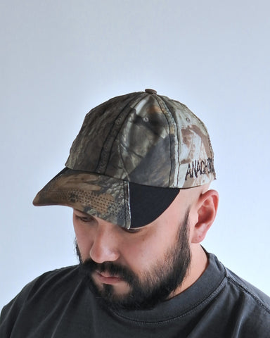 オリジナルリアルツリー生地のキャップに黒色の生地を切り替え配色にしたデザインキャップ