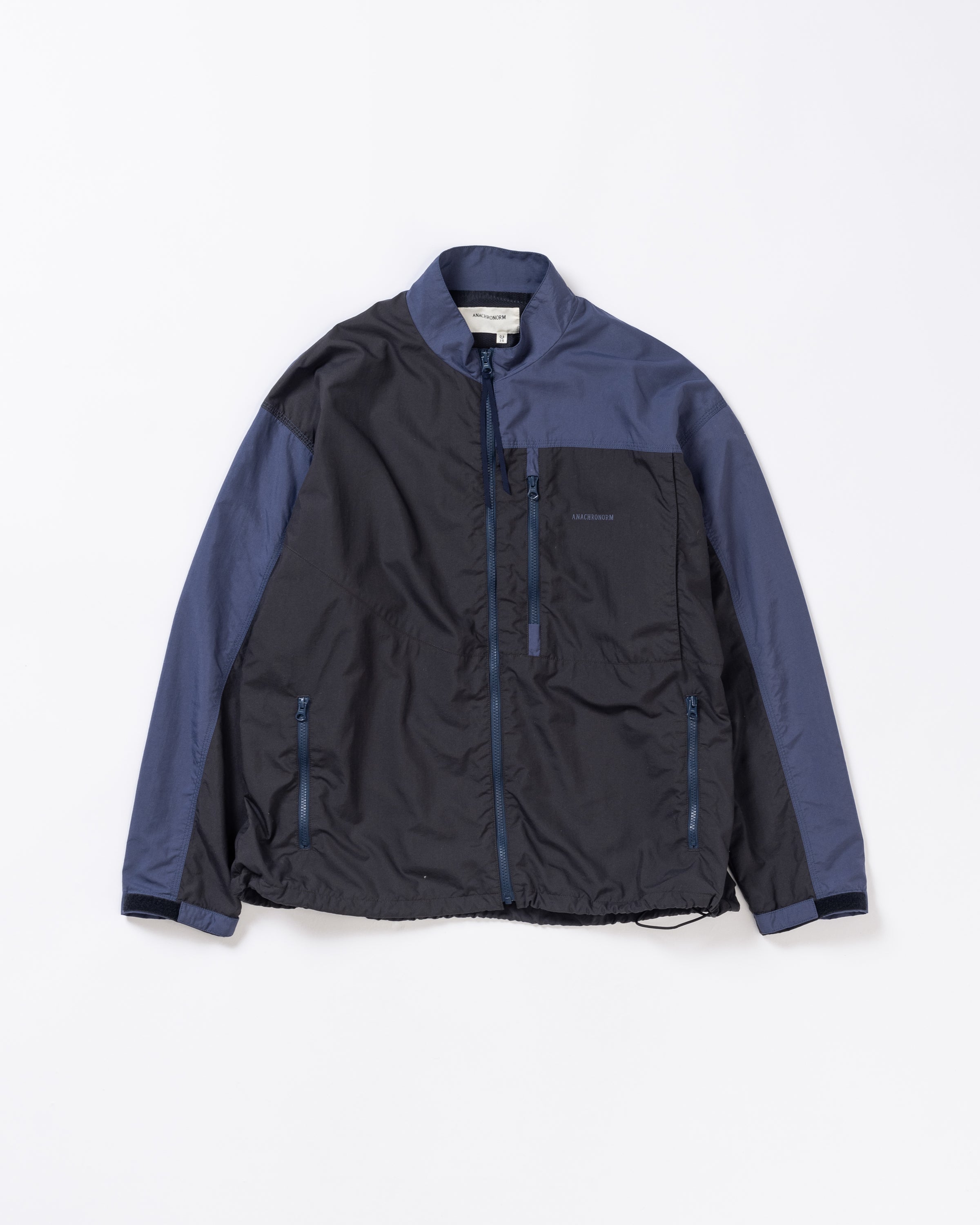 AN387 EXCHANGE PATTERN NYLON JACKET NAVY×BLACK – ANACHRONORM