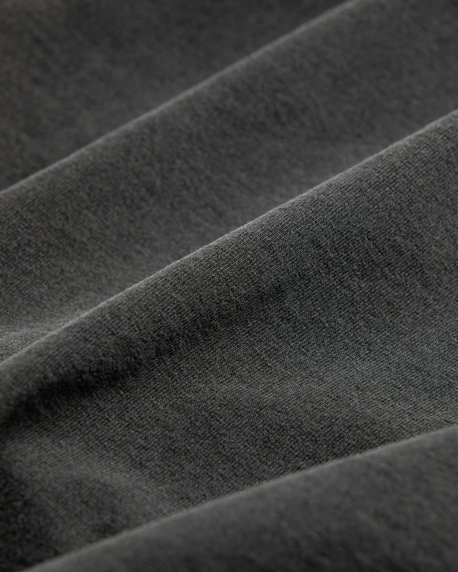 "マンチェスター" "ネブワース"カルチャーの発信源の地をスーベニア風にプリントデザインしブラックに顔料染めしたロンT