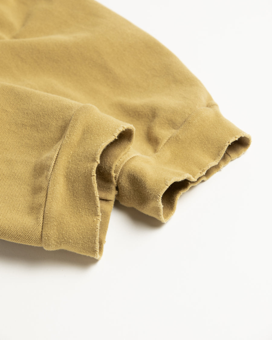 鹿の子生地を使用し硫化染サスティナブルブリーチ加工しダメージを加えたライトブラウン色のロングスリーブTシャツ