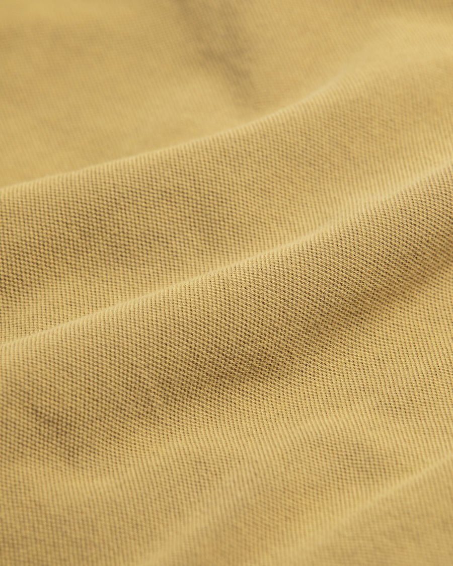 鹿の子生地を使用し硫化染サスティナブルブリーチ加工しダメージを加えたライトブラウン色のロングスリーブTシャツ