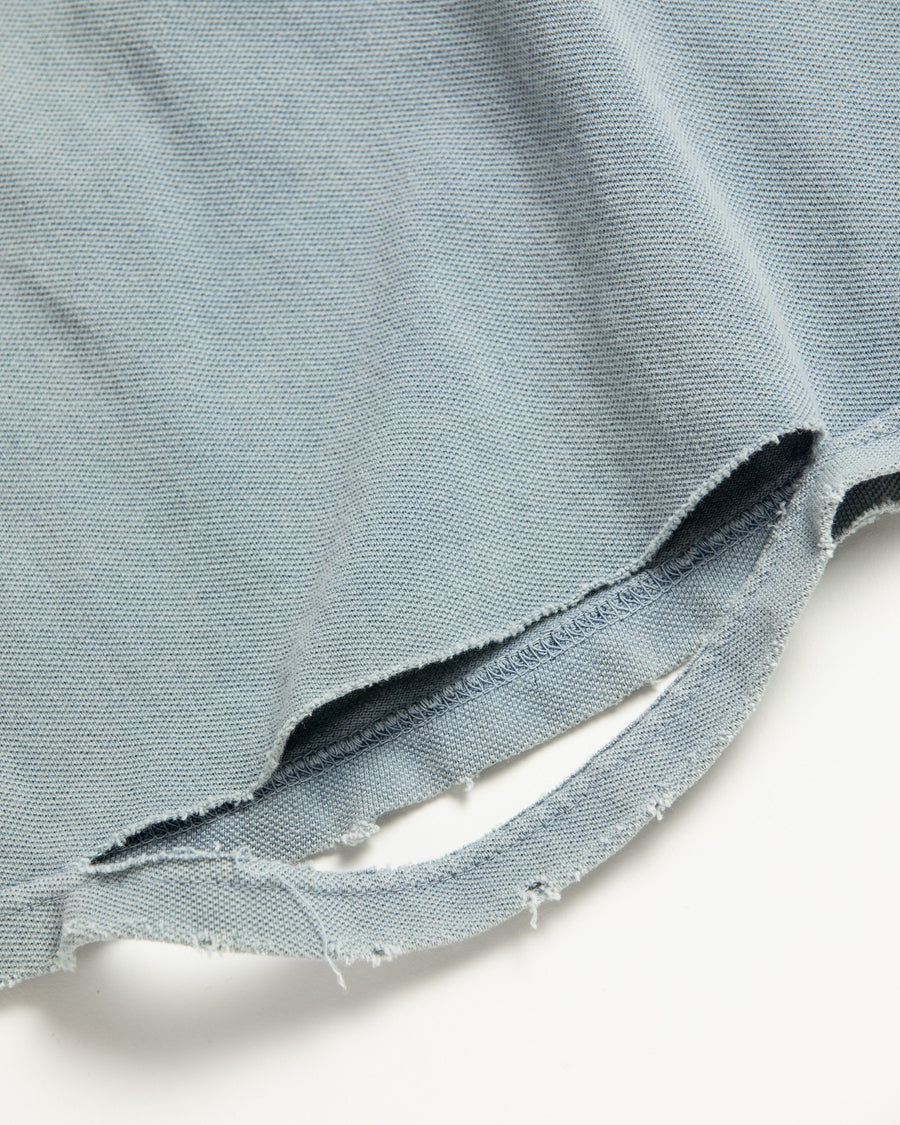 鹿の子生地を使用し硫化染サスティナブルブリーチ加工しダメージを加えたライトブルー色のロングスリーブTシャツ