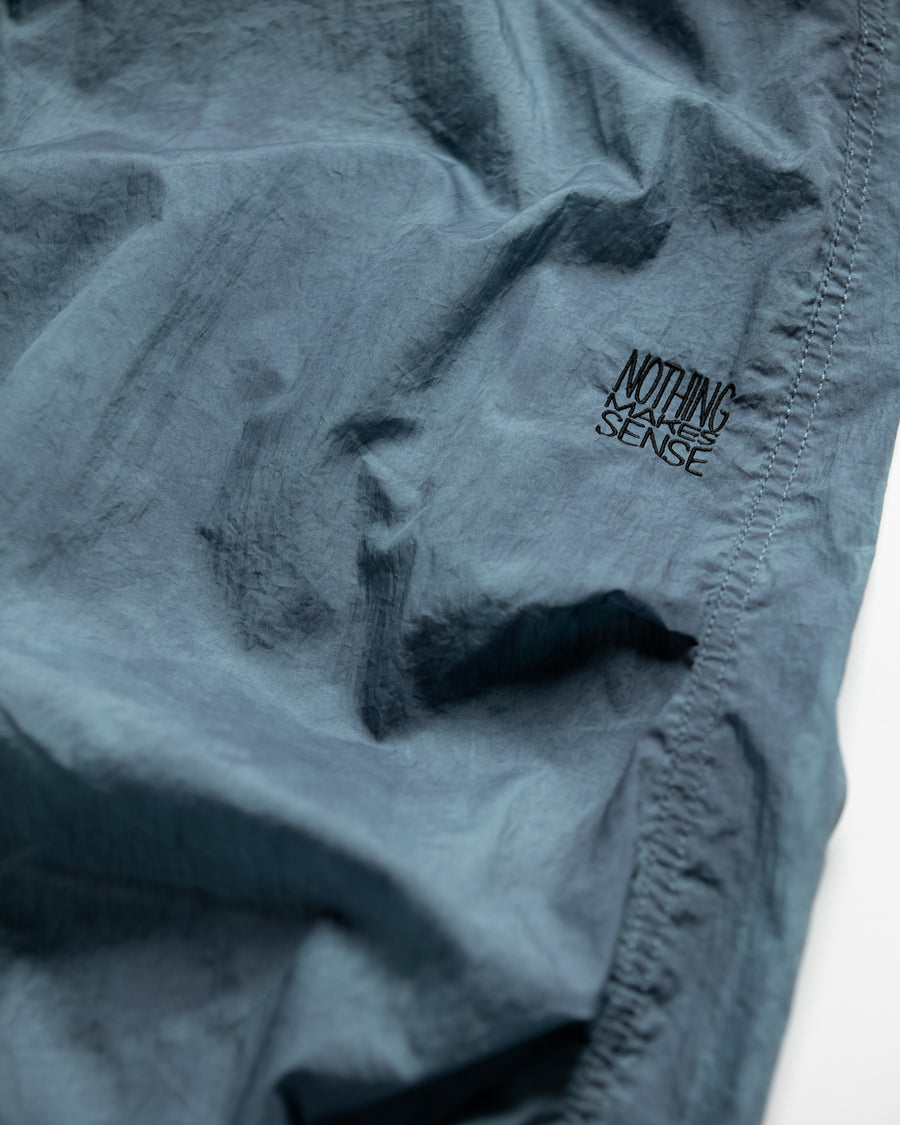 AN344 UTILITY NYLON TUCK EASY PANTS BLUE