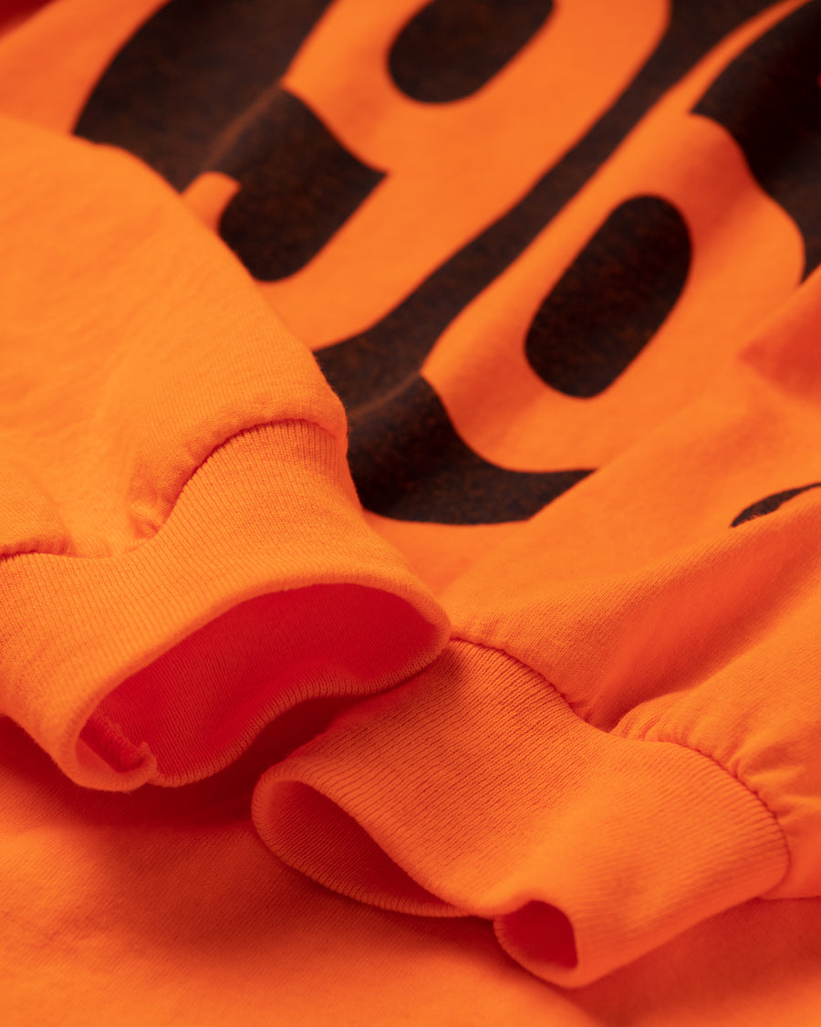 ANACHRONORM ナンバー"96" ロングスリーブTシャツ オレンジ | GILDAN 6.0oz オープンエンド糸 ワンウォッシュ 90sスケートブランド ロゴモチーフ
