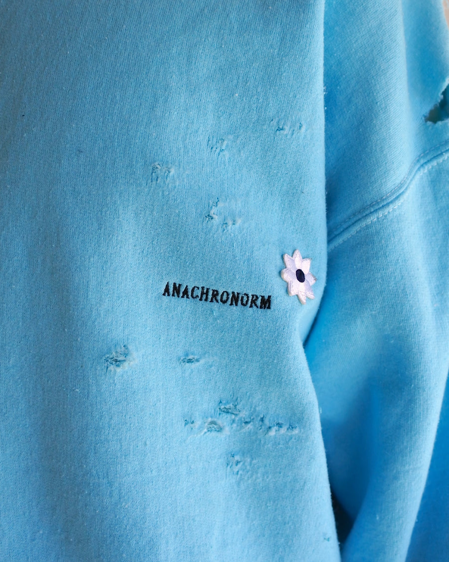 AN20TH-010 AN×NIC HAND PRINT FLOWER DAMAGED SWEAT SKY BLUE